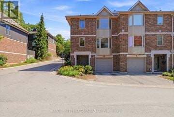 London North (North G) townhouse for rent - A building with the text "CENTURY 21 FIRST CANADIAN CORP. Brokerage" on the bottom right corner.
