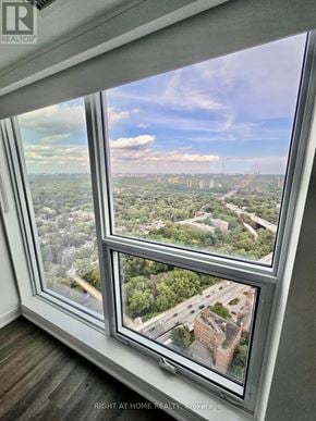 Toronto (North St. James Town) house for rent - A view from a window looking out at a cityscape.