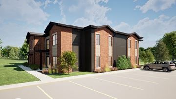 Washington apartment for rent - A rendering of a modern brick building with a parking lot in front.