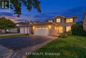 Oshawa (Northglen) apartment for rent - A house with a driveway and garage is shown in the image.