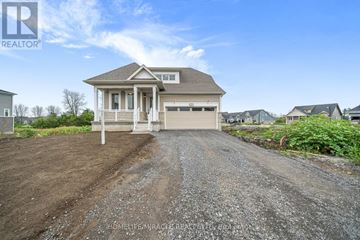 Loyalist (Bath) apartment for rent - A house with a gravel driveway in front of it.