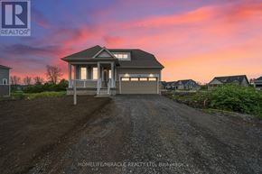 Loyalist (Bath) apartment for rent - A house with a gravel driveway in front of it.
