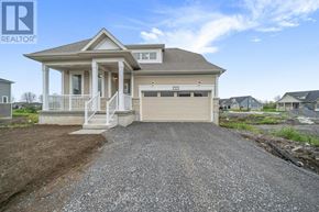 Loyalist (Bath) apartment for rent - A house with a gravel driveway in front of it.