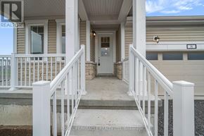 Loyalist (Bath) apartment for rent - A front porch with white railings and a white door.