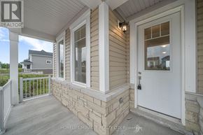 Loyalist (Bath) apartment for rent - A white door is on the right side of a house.