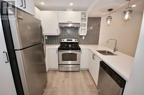 Hamilton (Mountview) apartment for rent - A modern kitchen with a stainless steel refrigerator and a black dishwasher.
