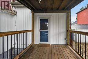 Hamilton apartment for rent - A balcony with a door and a window.