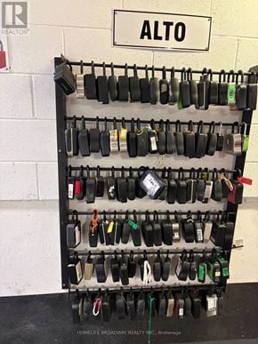 Toronto (Henry Farm) condo for rent - A brokerage rack with many locks and a sign that says Alto.