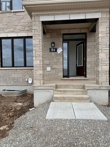 Brampton (Northwest Brampton) townhouse for rent - A house with a brown door and a number 266 on the wall.