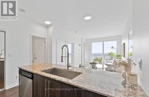 Mississauga (Creditview) condo for rent - A modern kitchen with granite countertops and stainless steel appliances.