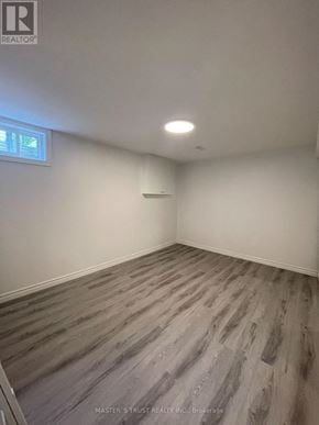 Toronto (Agincourt North) apartment for rent - A room with wooden flooring and a window.