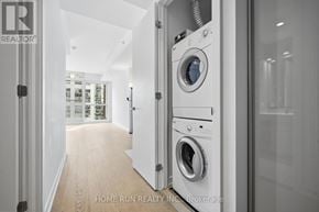 Ottawa condo for rent - A modern laundry room with a washer and dryer built into the wall.