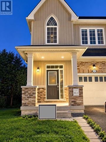 Lincoln (Beamsville) townhouse for rent - A house with a brown door and a window is shown.