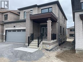 Oshawa (Kedron) apartment for rent - A house under construction with a grey garage door.