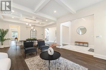 Burlington (Roseland) apartment for rent - A living room with a black table and chairs.