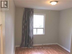 Richmond Hill (North Richvale) apartment for rent - A room with a window and a curtain is for rent.