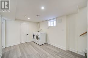 Toronto (Dorset Park) apartment for rent - A laundry room with a washer and dryer.