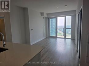 Mississauga (City Centre) condo for rent - A spacious kitchen with a view of the city.