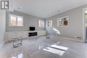 Toronto (Don Valley Village) apartment for rent - A spacious living room with a glass coffee table in the middle.