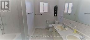 Oakville (Cp College Park) apartment for rent - A bathroom with a tub, sink, and toilet.