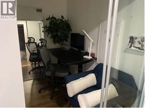 Burnaby apartment for rent - A conference room with a table, chairs and a plant.