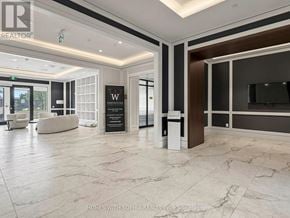 Toronto (Humber Heights) condo for rent - A reception area with a sign that says "W" on it.