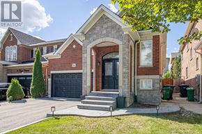 Brampton (Fletcher's Meadow) apartment for rent - A house with a black front door and a stone archway entrance.