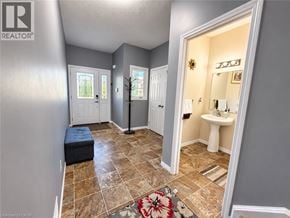 Waterloo apartment for rent - A bathroom with a toilet, sink, and a window.