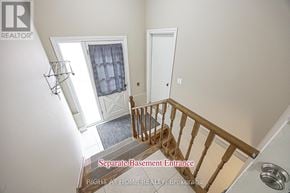 Whitchurch-Stouffville (Stouffville) apartment for rent - A staircase with a separate base ment entrance.