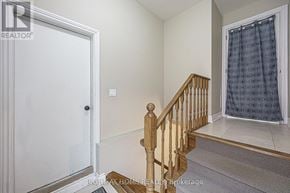 Whitchurch-Stouffville (Stouffville) apartment for rent - A room with a staircase leading to the second floor.