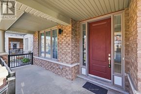 Whitby apartment for rent - A red door is on the front of a house.