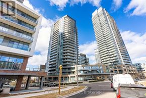 Toronto (Henry Farm) condo for rent - A white van is parked on the street in front of a building.