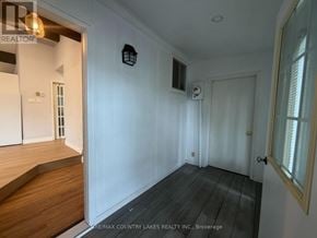 Ramara apartment for rent - A kitchen with white cabinets and a stainless steel oven.