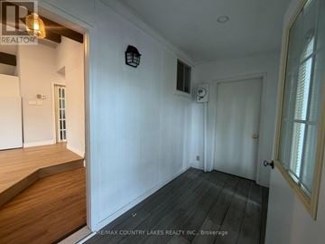 Ramara apartment for rent - A kitchen with white cabinets and a stainless steel oven.