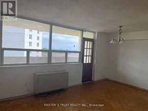 Toronto (Scarborough Village) condo for rent - A room with a window and a radiator.
