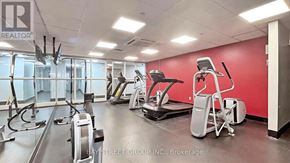 Toronto (Cabbagetown-South St. James Town) condo for rent - A gym with treadmills, elliptical machines, and other exercise equipment.