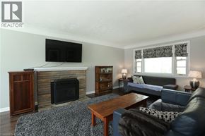 Burlington apartment for rent - A living room with a fireplace and a couch.