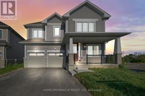 Loyalist (Bath) apartment for rent - A modern two-story house with a garage is presented by Homelife/Miracle Realty LTD.