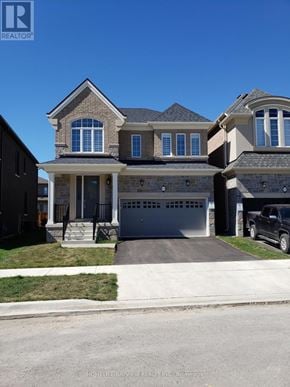 Oakville (Go Glenorchy) apartment for rent - A large house with a garage is shown in the image.