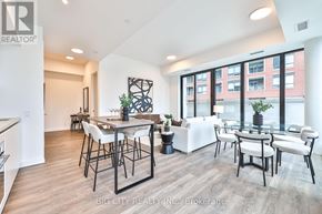 Toronto (Thorncliffe Park) condo for rent - A well-lit, modern dining area with a large table and chairs.