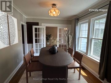 Guelph (St. Patrick's Ward) apartment for rent - A dining room with a table and chairs.