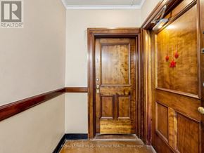 Halton Hills (Georgetown) multi-family for rent - A wooden door with a glass window in the middle.