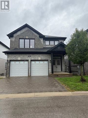 London South (South U) house for rent - A two-story house with a garage is for sale.