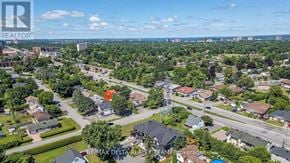 Ottawa apartment for rent - An aerial view of a neighborhood with a REMAX Delta Realty Team Brokerage logo.