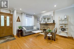 Toronto (Woodbine Corridor) apartment for rent - A living room with a grey couch and a wooden floor.