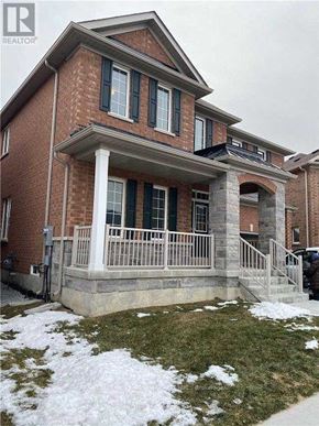 Brampton (Sandringham-Wellington) apartment for rent - A brick house with a porch and a covered entrance.