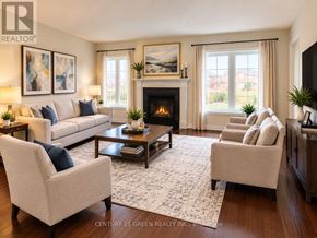 Brampton (Sandringham-Wellington) apartment for rent - A living room with a fireplace and a couch.