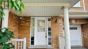 Brampton (Bram West) townhouse for rent - A house with a white door and a porch.