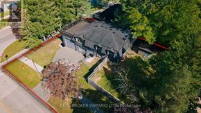 Kitchener apartment for rent - A large house with a red line in front of it.