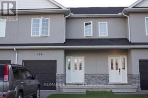 Woodstock (Woodstock - South) townhouse for rent - A house with the number 498 on the front door.